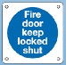 Fire door keep locked shut with radius corners and fixing holes safety sign